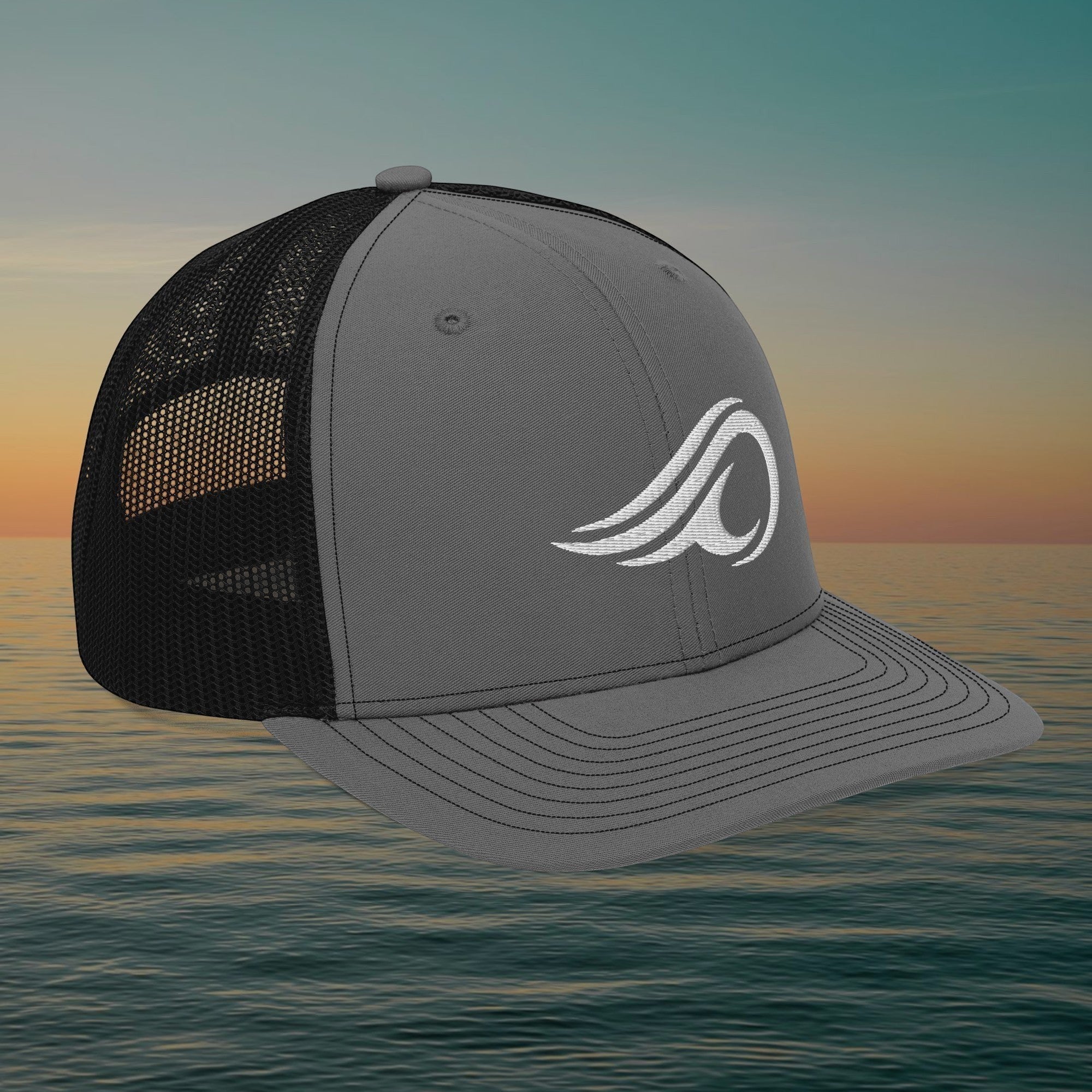 Deepwater Crew Co. grey and black trucker cap with white embroidered wave logo and breathable mesh back