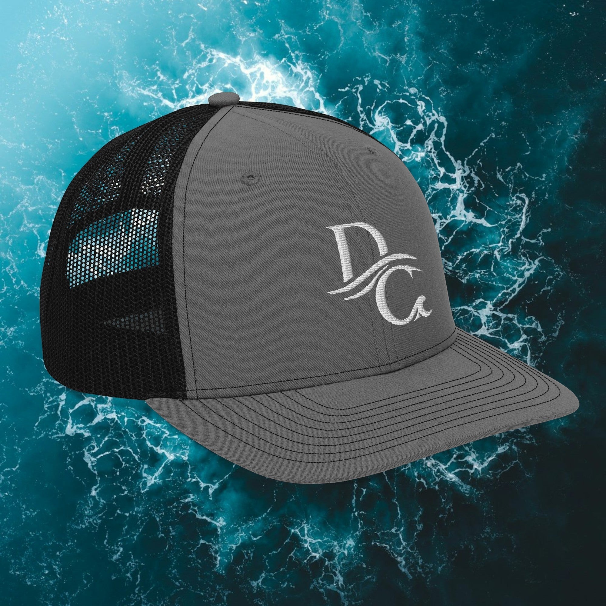 Deepwater Crew Co. grey and black snapback trucker cap with embroidered white logo on the front structured panel