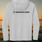 Deepwater Crew Co. light grey long sleeve tri-blend hoodie with black logo on the back against a sunset ocean view.