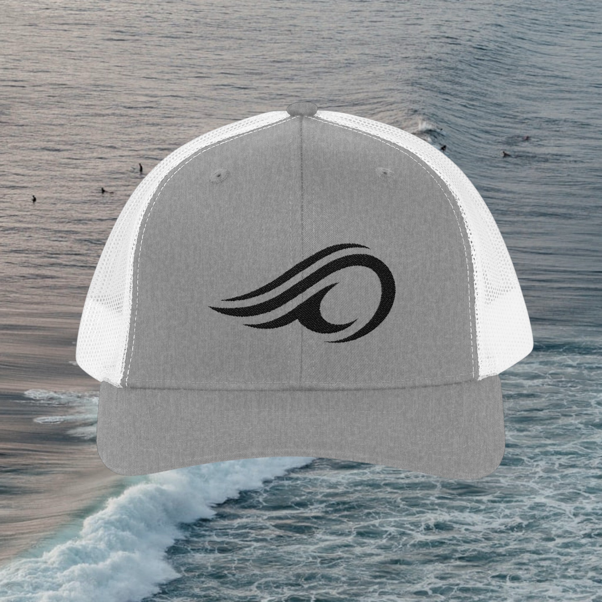 Deepwater Crew Co. grey trucker hat with white mesh back and black wave logo embroidery.