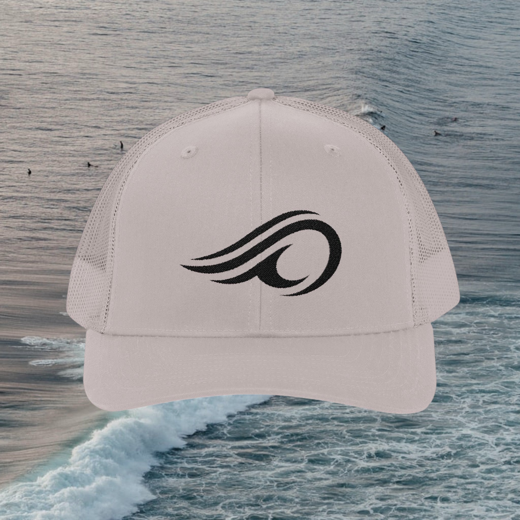 Deepwater Crew Co. light grey trucker hat with black wave logo embroidery and mesh back