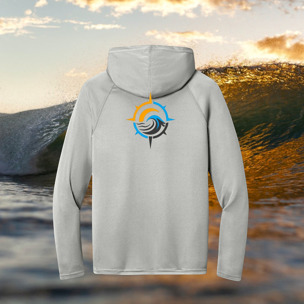 Deepwater Crew Co. light grey performance UPF hoodie with a compass wave logo on the back against an ocean wave