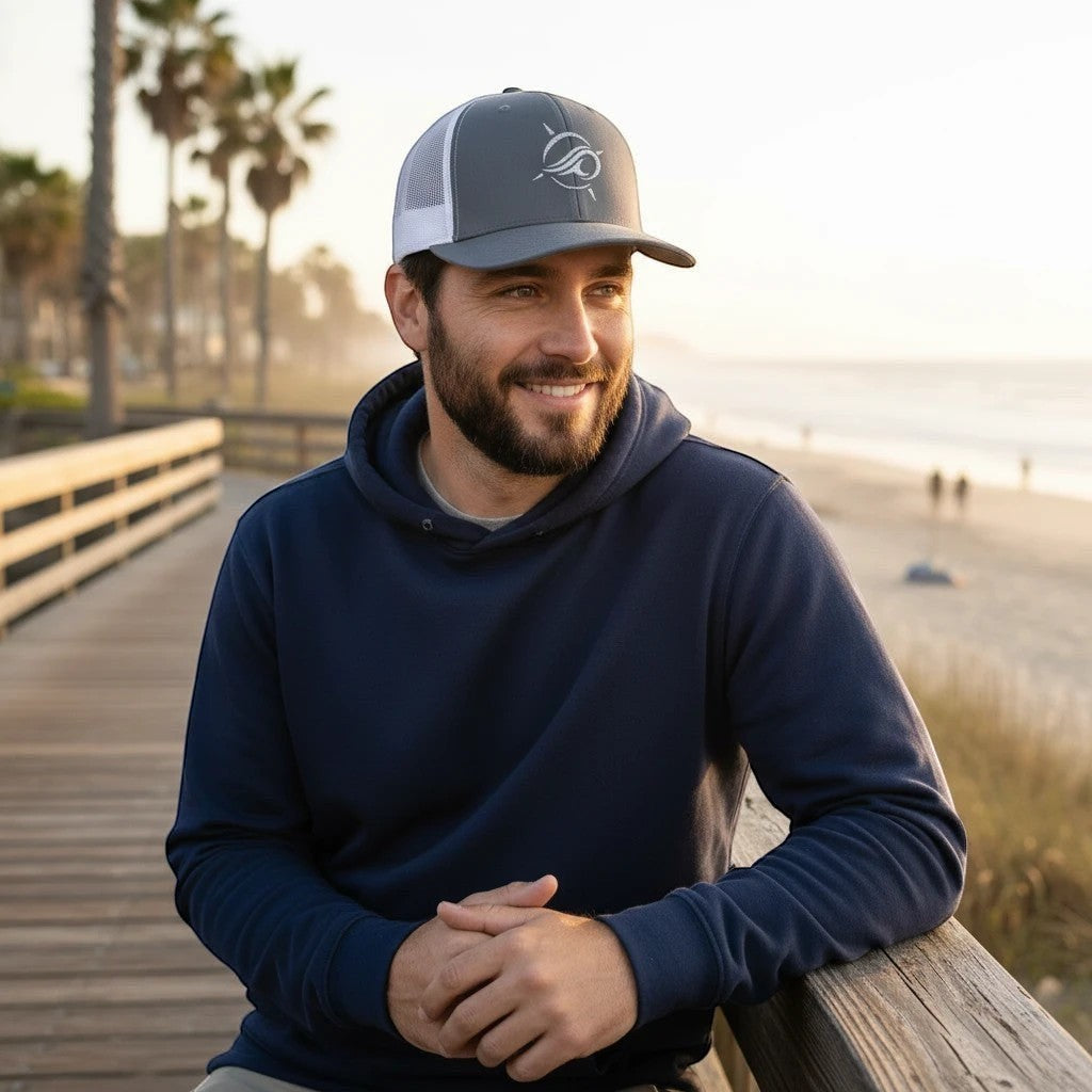 Deepwater Crew Co. grey and white trucker hat with embroidered wave logo, structured front, and mesh back.