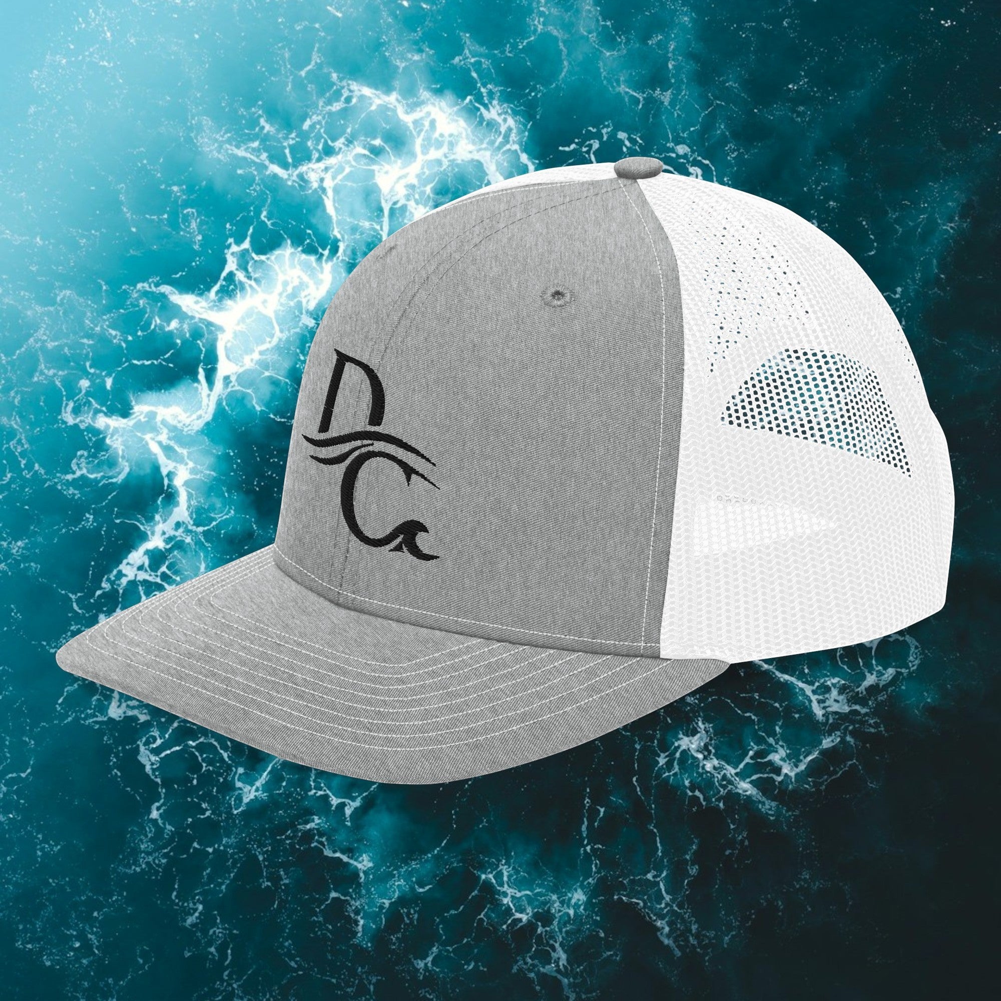 Deepwater Crew Co. grey and white trucker hat with embroidered wave logo and breathable mesh back