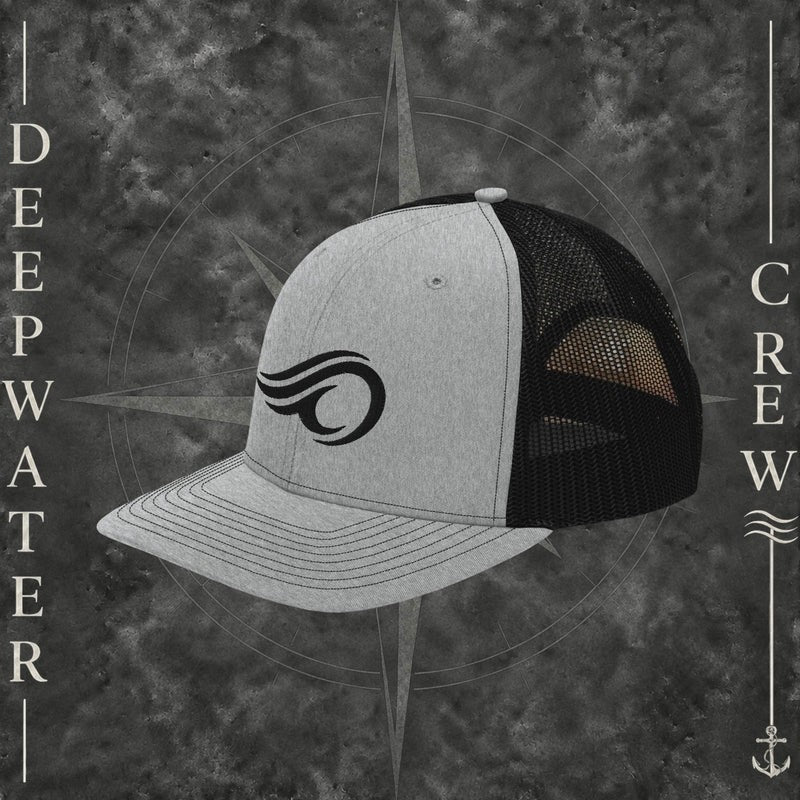 Deepwater Crew Co. heather gray and black Richardson 112 trucker hat with black embroidered wave logo, breathable mesh back, and structured six-panel design with snapback closure.
