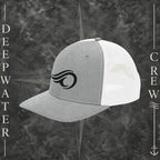 Deepwater Crew Co. heather gray and white Richardson 112 trucker hat with black embroidered wave logo, breathable mesh back, and structured six-panel design with snapback closure.