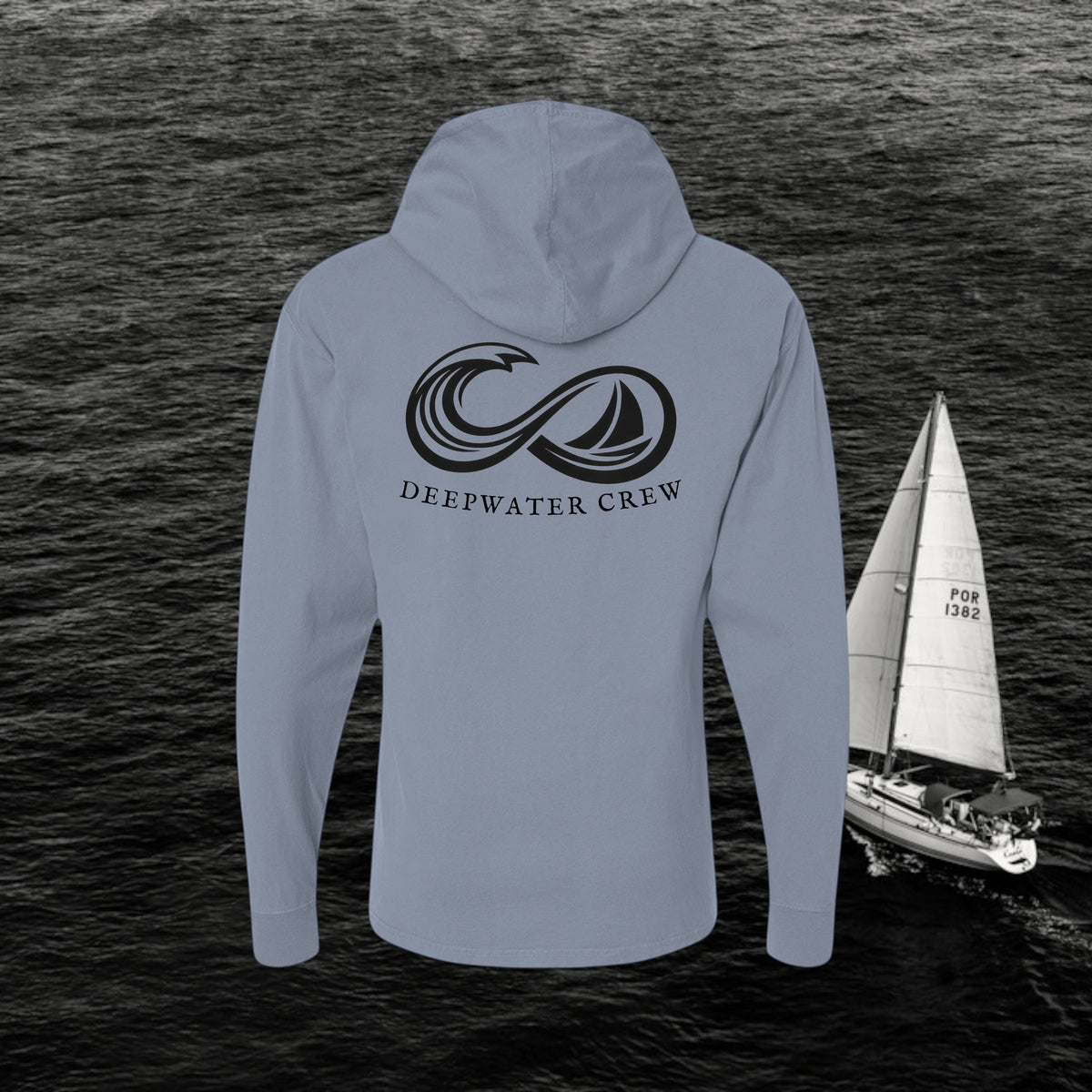 Saltwater Deepwater Crew Co. Keep Sailing cotton hooded long-sleeve T-shirt, back view with large infinity-style ocean wave and sailboat graphic above Deepwater Crew lettering.