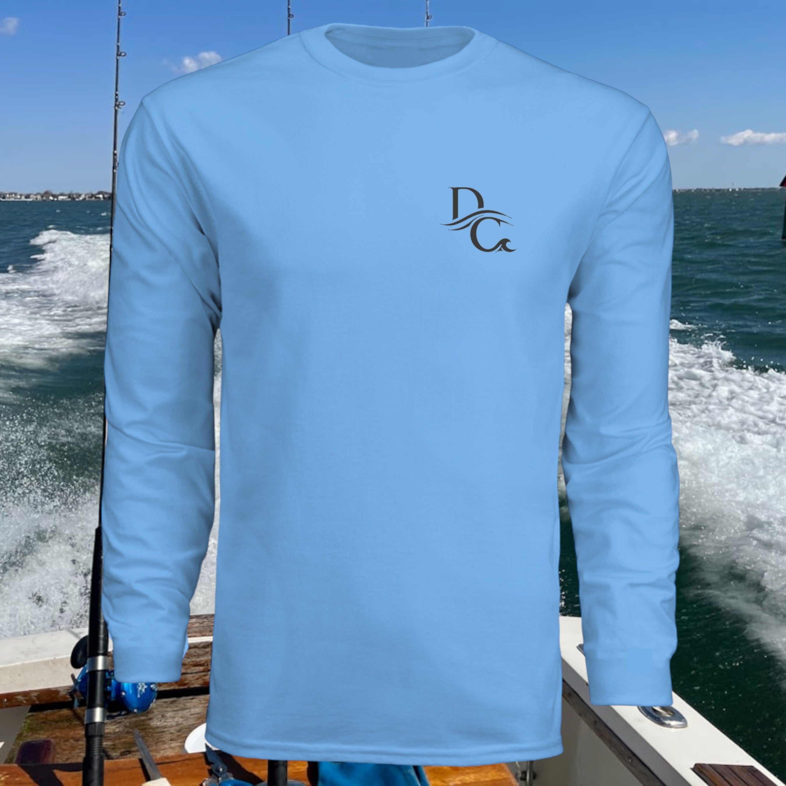 Deepwater Crew Co. light blue long-sleeve polyester performance tee with UPF 44+ sun protection and a small logo on the chest.