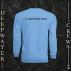 Deepwater Crew Co. light blue long-sleeve performance sun shirt with logo on back, shown on a boat deck.
