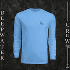 Deepwater Crew Co. light blue long-sleeve performance sun shirt with UPF 44+ protection on a boat deck.