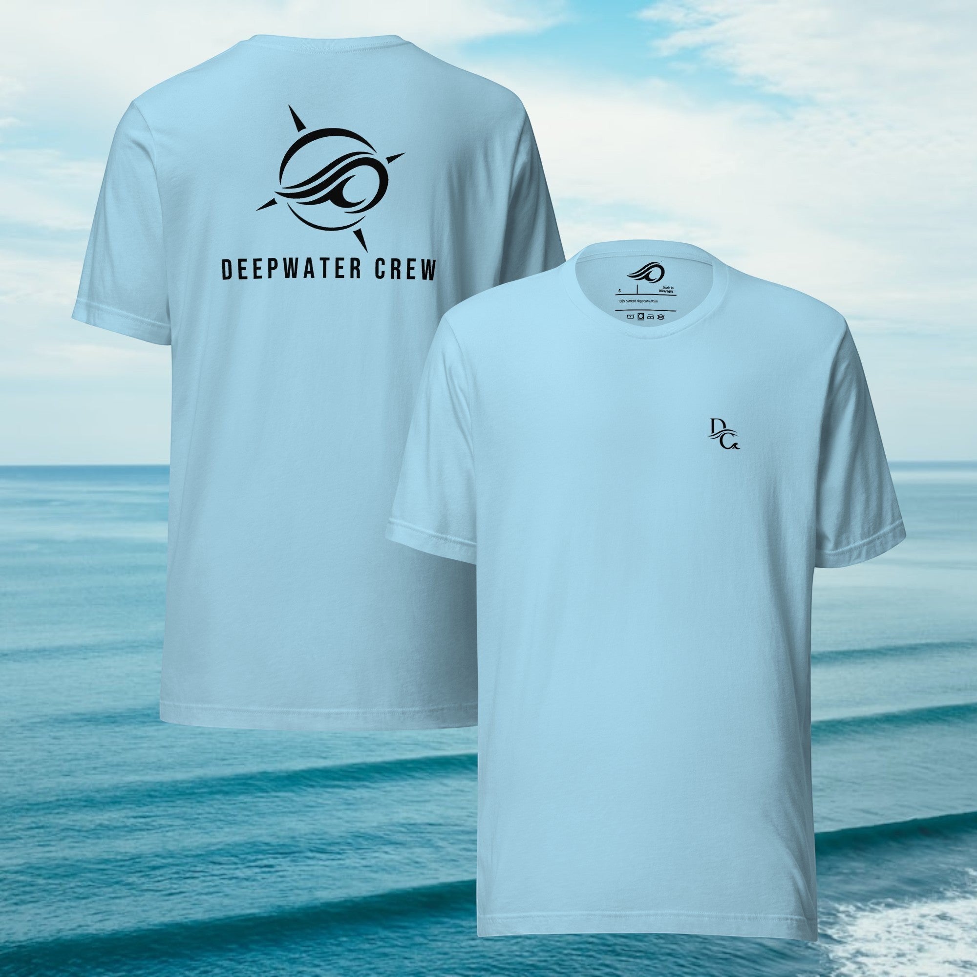 Deepwater Crew Co. light blue cotton crew neck t-shirt with front logo and large back graphic against ocean background.
