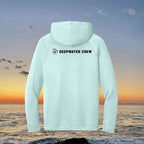 Deepwater Crew Co. light blue performance UPF hoodie with back logo, featuring moisture-wicking recycled fabric.
