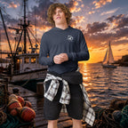 Deepwater Crew Co. navy heathered long-sleeve hooded tee with white logo on chest, worn by a man with curly hair.