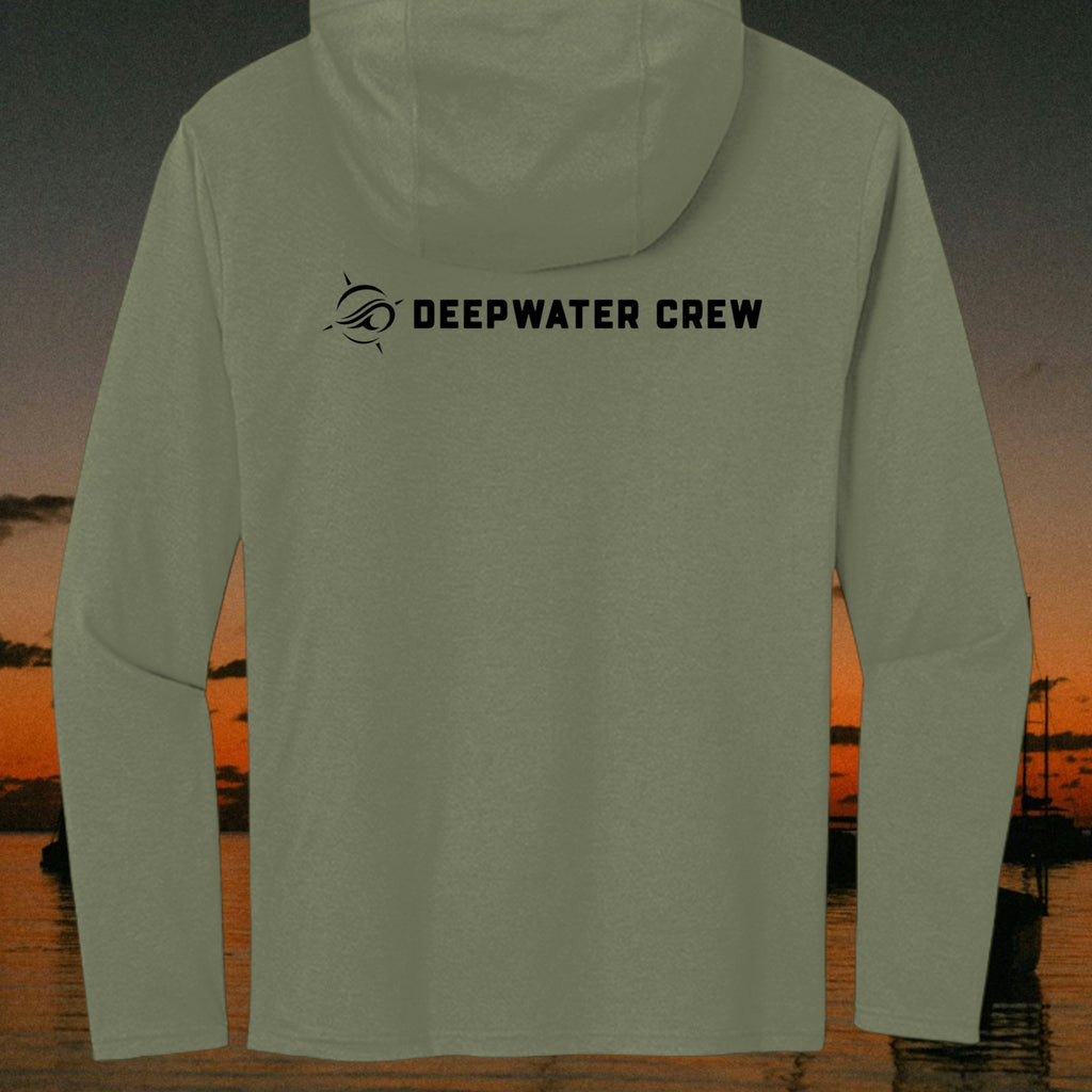 Deepwater Crew Co. olive green long sleeve tri-blend hoodie with black logo on the back against a sunset coastal backdrop