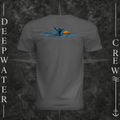 Asphalt Deepwater Crew Co. Salt Runs Deep crewneck T-shirt, back view with shaka hand, ocean waves, distant mountains, orange sunset, seabirds, and “Salt Runs Deep” lettering.