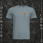 Blue Storm Deepwater Crew Co. Salt Runs Deep crewneck T-shirt, front view with small tropical DC sunset-and-wave crest logo.
