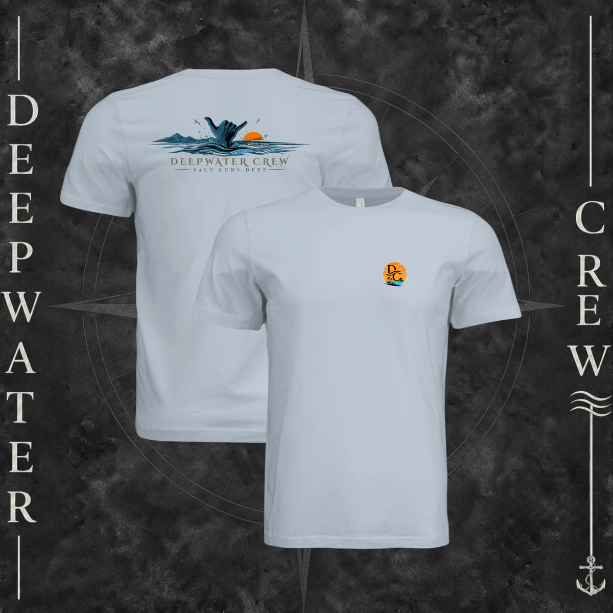 Light Blue Deepwater Crew Co. Salt Runs Deep crewneck T-shirt showing front and back views with tropical DC sunset-and-wave chest logo and shaka, ocean waves, mountains, sunset, seabirds, and Salt Runs Deep back graphic.