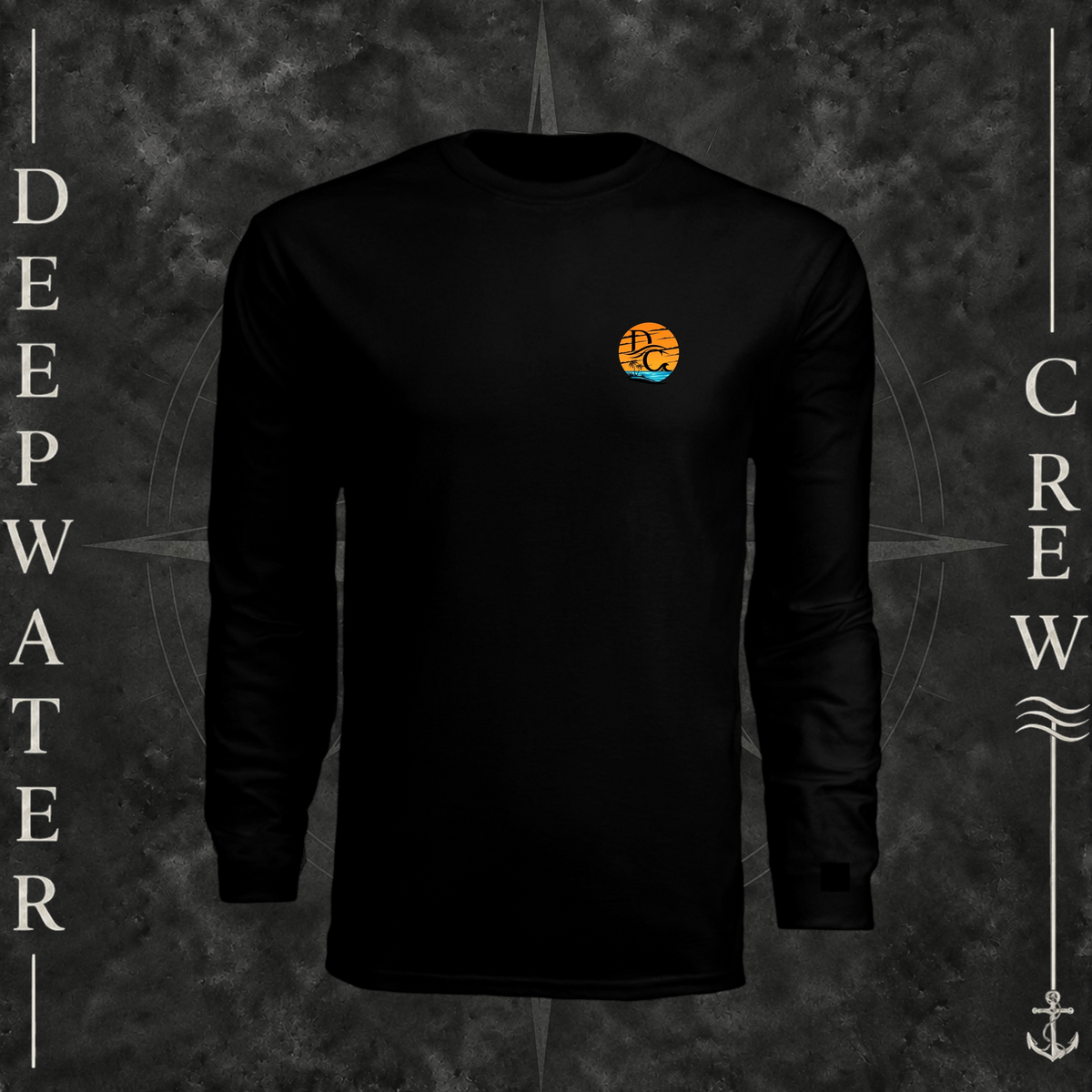 Black Deepwater Crew Co. Salt Runs Deep UPF 44+ long-sleeve performance shirt, front view with small tropical DC sunset-and-wave crest logo.