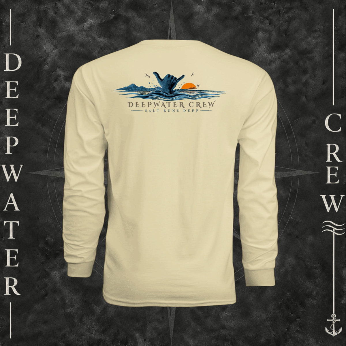Light Yellow Deepwater Crew Co. Salt Runs Deep UPF 44+ long-sleeve performance shirt, back view with shaka hand, ocean waves, distant mountains, orange sunset, seabirds, and “Salt Runs Deep” lettering.