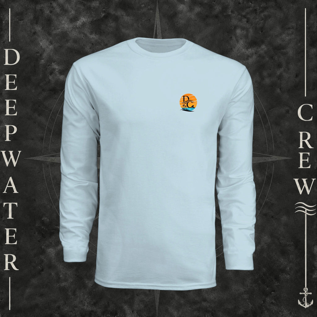 Pastel Blue Deepwater Crew Co. Salt Runs Deep UPF 44+ long-sleeve performance shirt, front view with small tropical DC sunset-and-wave crest logo.