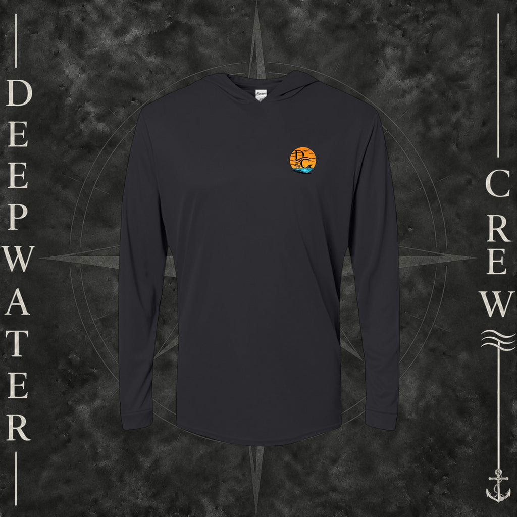 Black Deepwater Crew Co. Salt Runs Deep UPF 50+ performance hoodie, front view with small tropical DC sunset-and-wave crest logo.