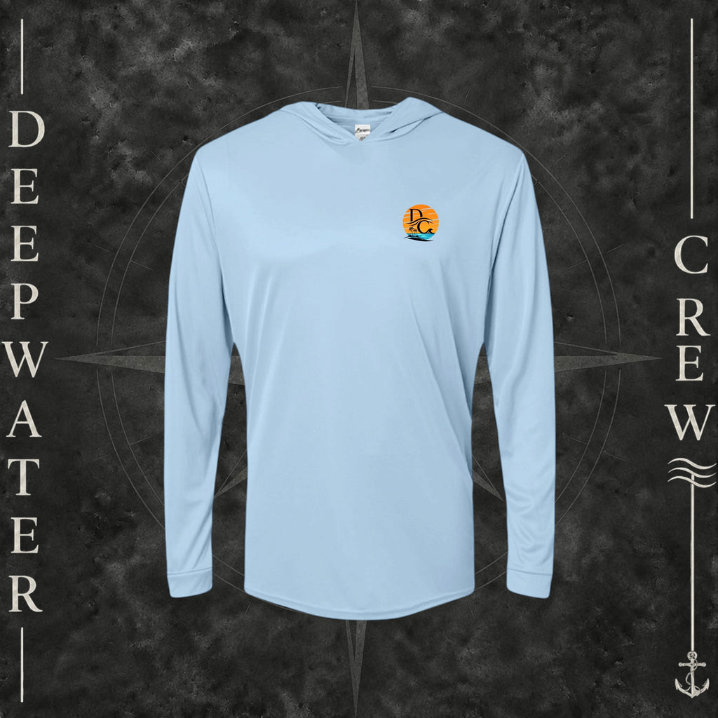 Blue Mist Deepwater Crew Co. Salt Runs Deep UPF 50+ performance hoodie, front view with small tropical DC sunset-and-wave crest logo.