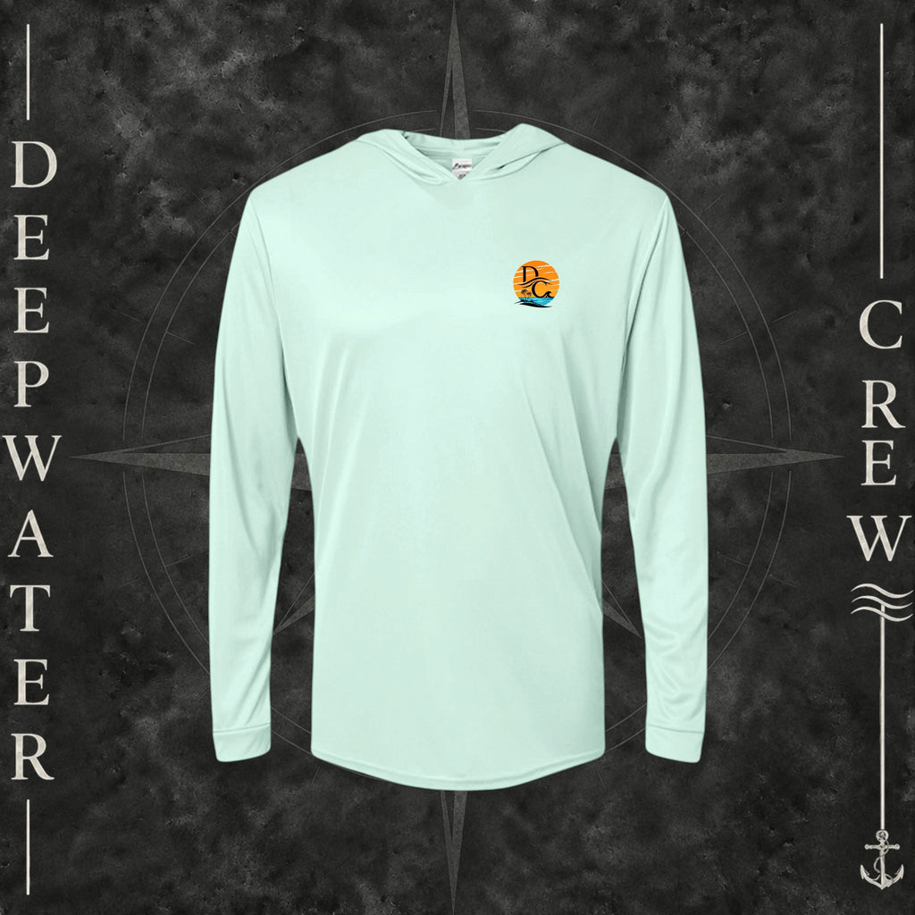 Mint Green Deepwater Crew Co. Salt Runs Deep UPF 50+ performance hoodie, front view with small tropical DC sunset-and-wave crest logo.