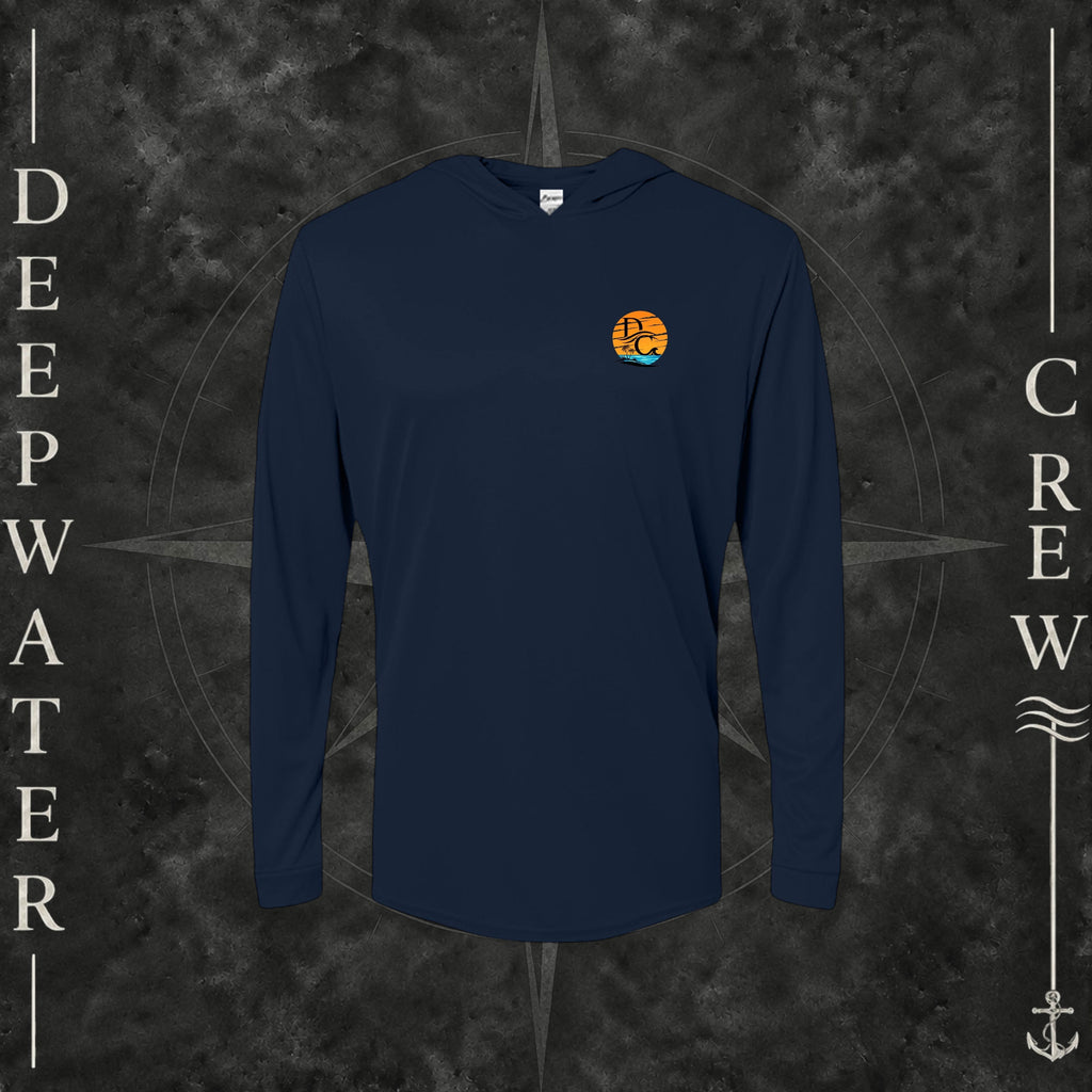Navy Deepwater Crew Co. Salt Runs Deep UPF 50+ performance hoodie, front view with small tropical DC sunset-and-wave crest logo.