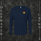 Navy Deepwater Crew Co. Salt Runs Deep UPF 50+ performance hoodie, front view with small tropical DC sunset-and-wave crest logo.
