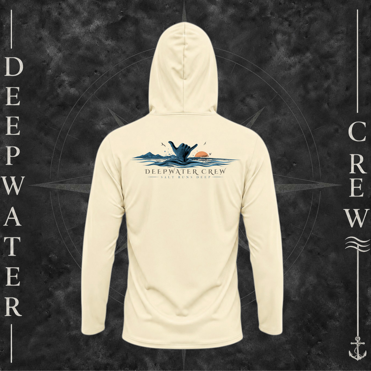 Pale Yellow Deepwater Crew Co. Salt Runs Deep UPF 50+ performance hoodie, back view with shaka hand, ocean waves, distant mountains, orange sunset, seabirds, and “Salt Runs Deep” lettering.