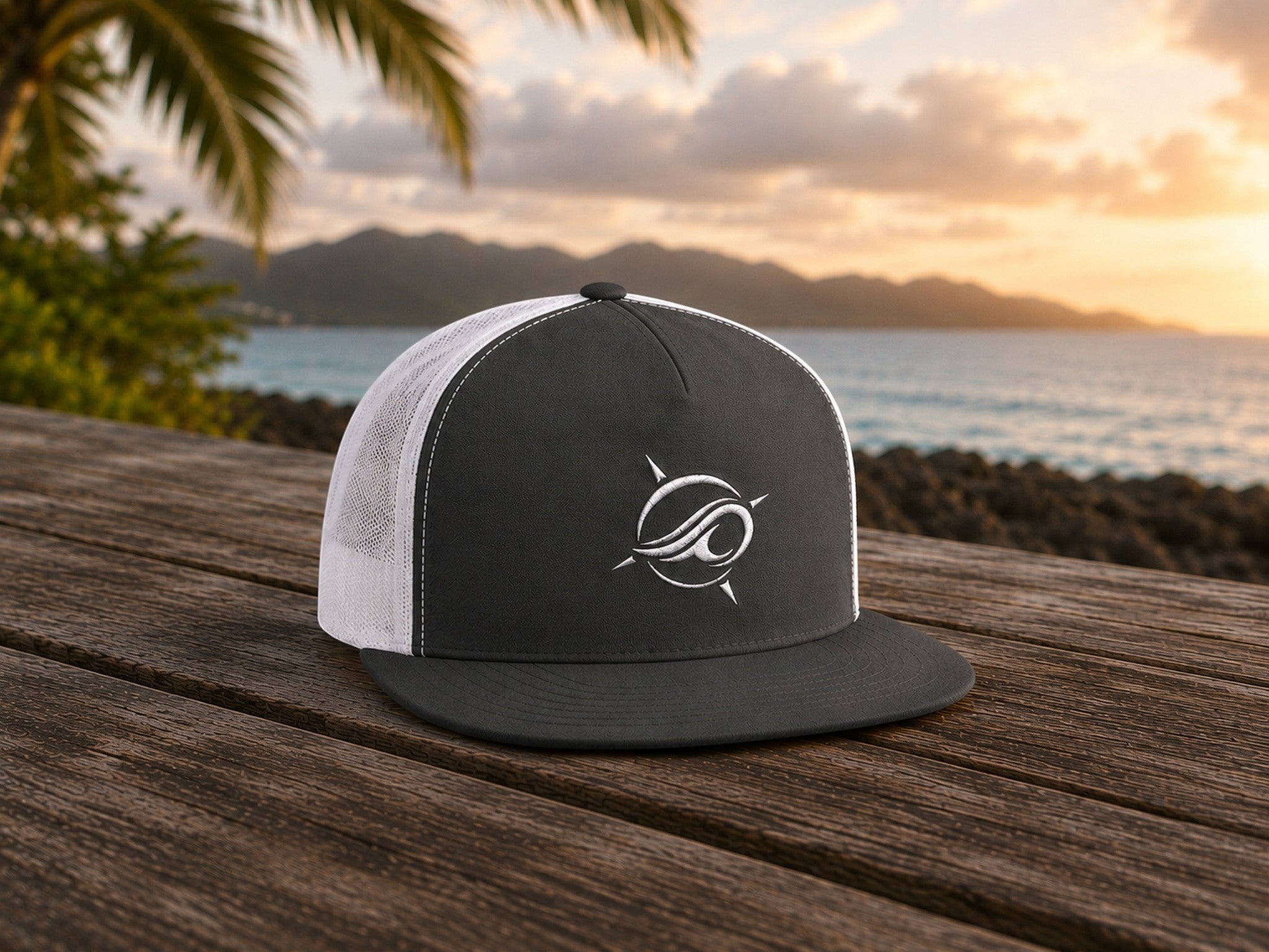 Deepwater Crew Co. dark grey trucker cap with white mesh back and embroidered wave compass logo. Flat bill.