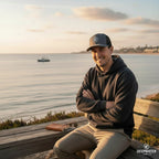 Deepwater Crew Co. dark grey trucker hat with embroidered logo, mesh back, and curved brim.