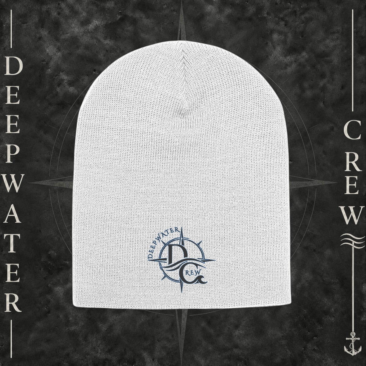 White Deepwater Crew Co. knit beanie with navy compass logo on front, Yupoong 1500 acrylic cap