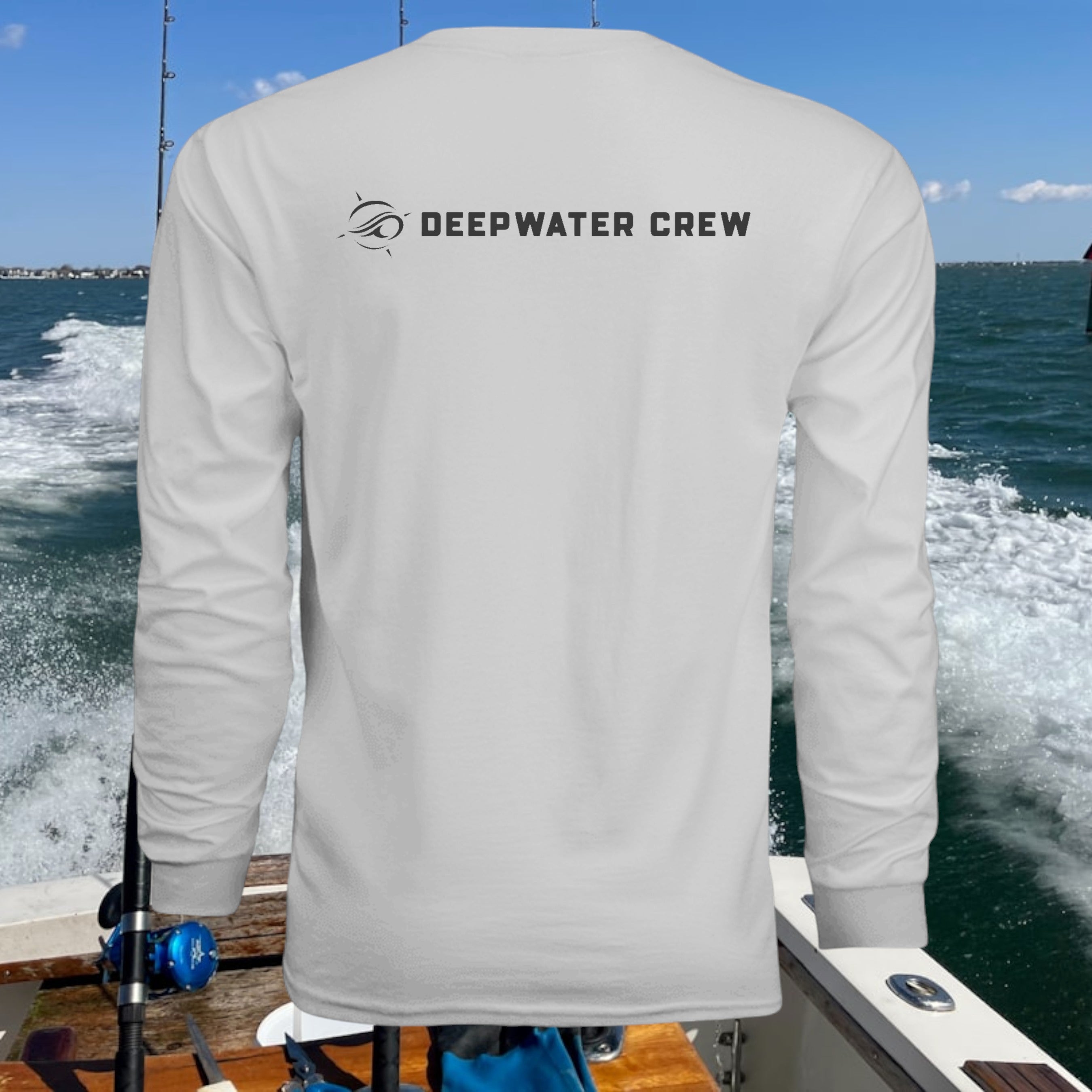 Deepwater Crew Co. white long-sleeve performance tee with UPF 44+ sun protection, ideal for outdoor activities.