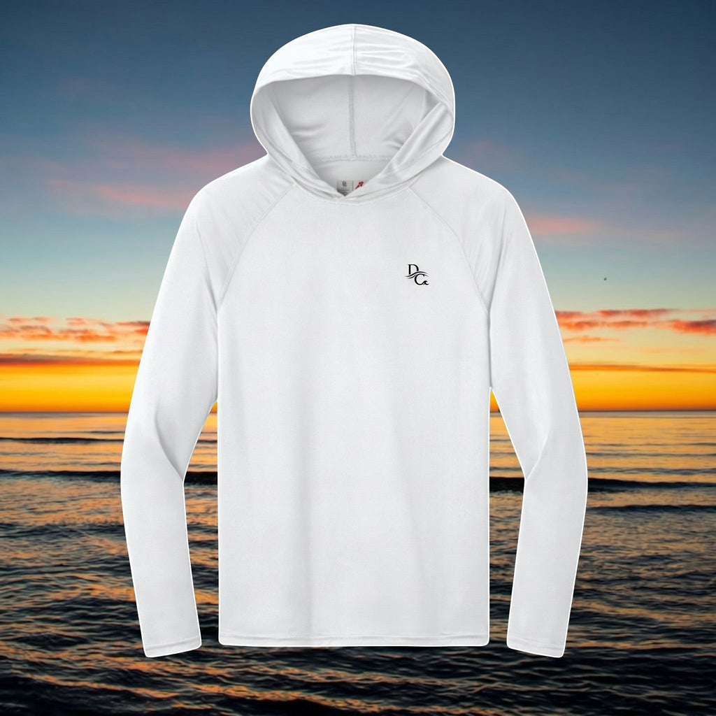 Deepwater Crew Co. white long-sleeve performance UPF hoodie with raglan sleeves against a sunset ocean background