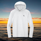 Deepwater Crew Co. white long-sleeve performance UPF hoodie with raglan sleeves against a sunset ocean background